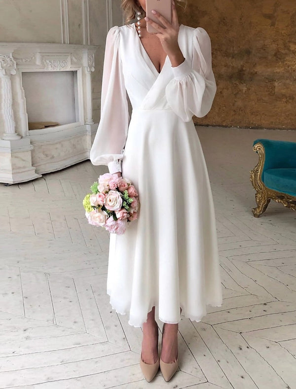 Brautkleid mit langen Ärmeln und feiner Ausstrahlung