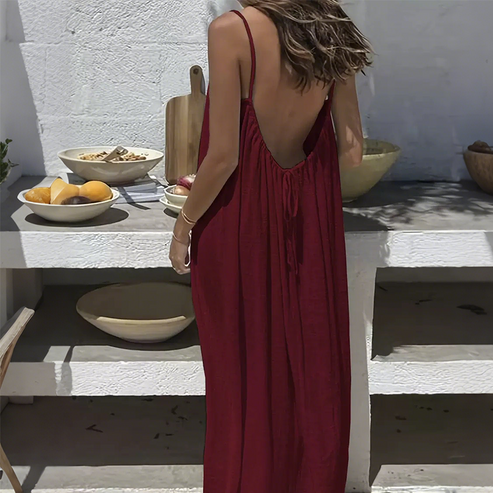 Langes Damenkleid mit schmalen Trägern offenem Rücken