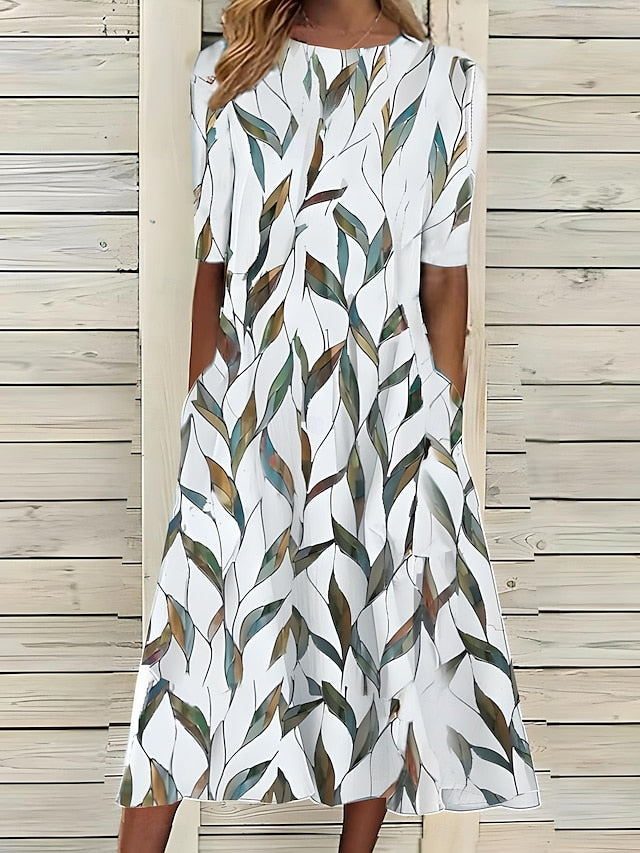 Sommerliches mittellanges Kleid mit ansprechendem Blumenmuster