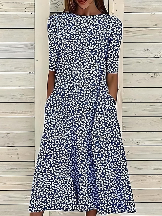 Sommerliches mittellanges Kleid mit ansprechendem Blumenmuster