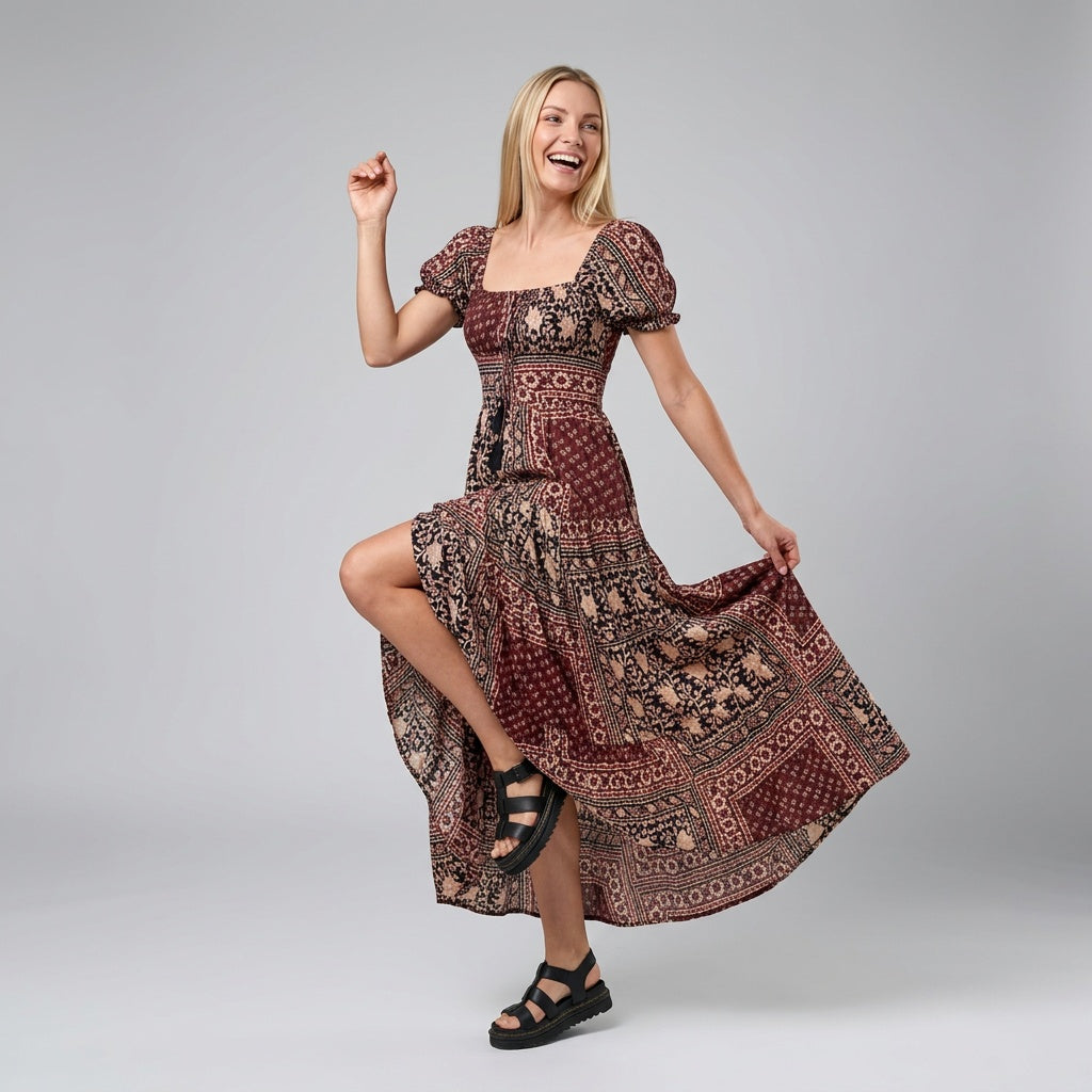 Unbeschwertes bodenlanges Kleid mit kurzen gebauschten Ärmeln