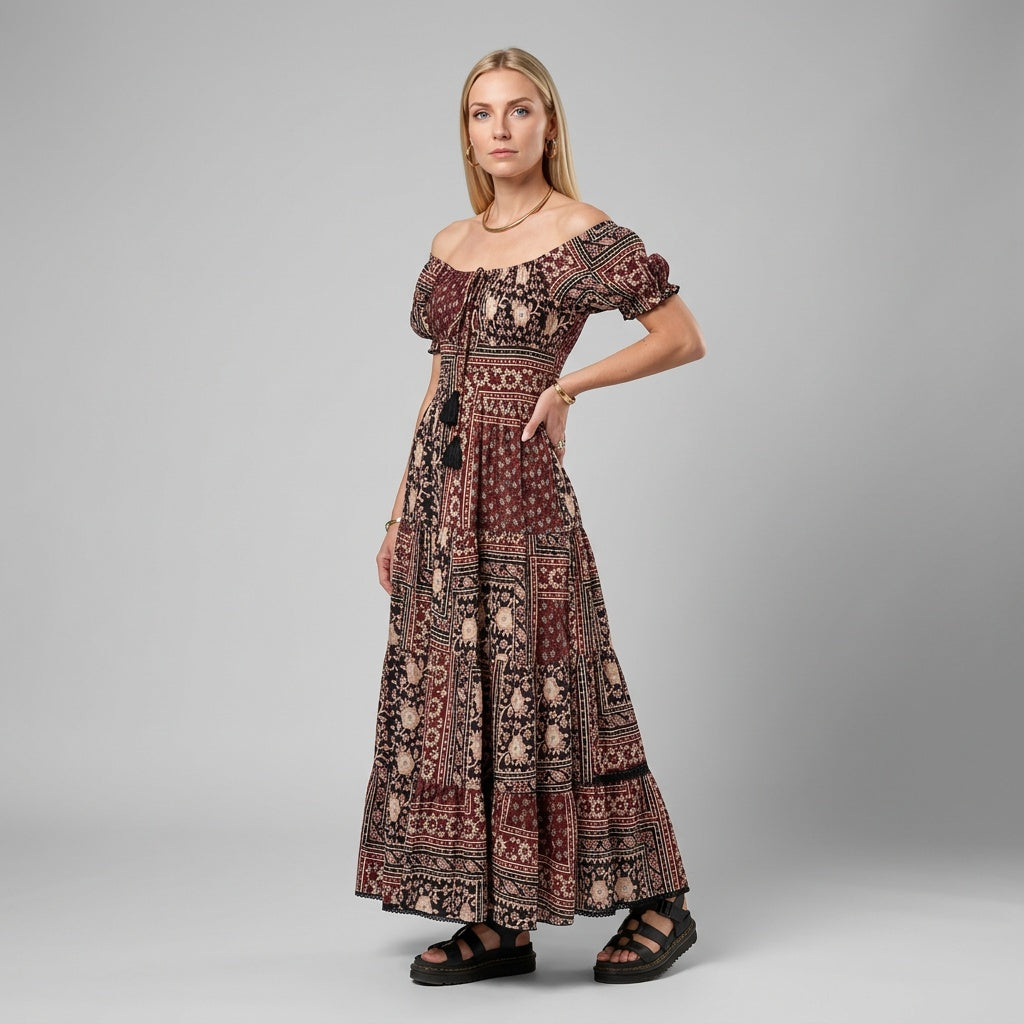 Unbeschwertes bodenlanges Kleid mit kurzen gebauschten Ärmeln