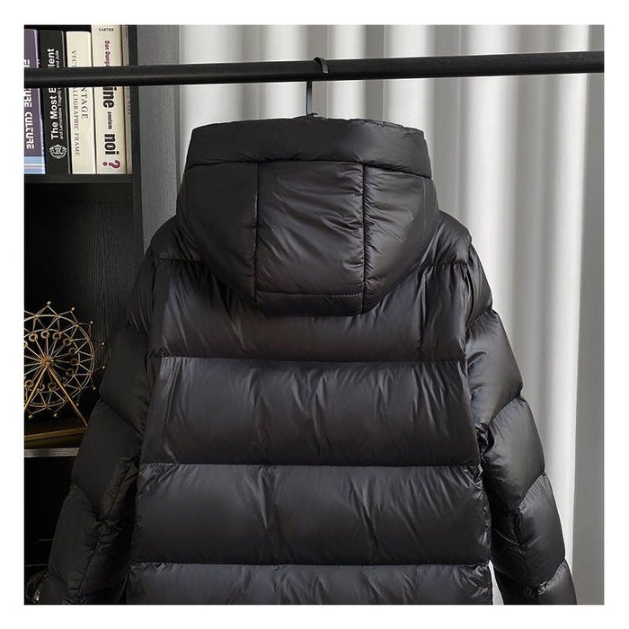 Vornehme lange Damenwinterjacke mit klarer Formgebung