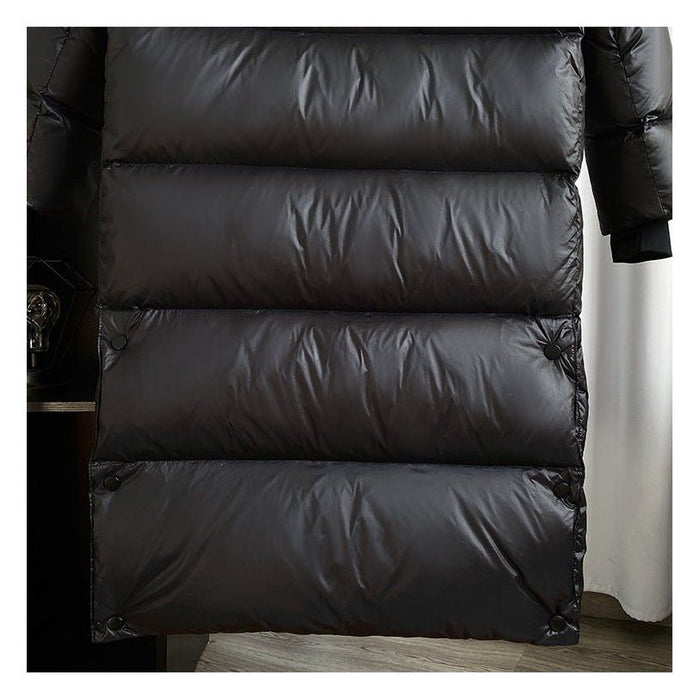 Vornehme lange Damenwinterjacke mit klarer Formgebung
