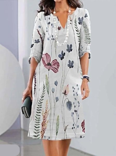 Wadenlanges Kleid mit Blumen und kurzen Ärmeln