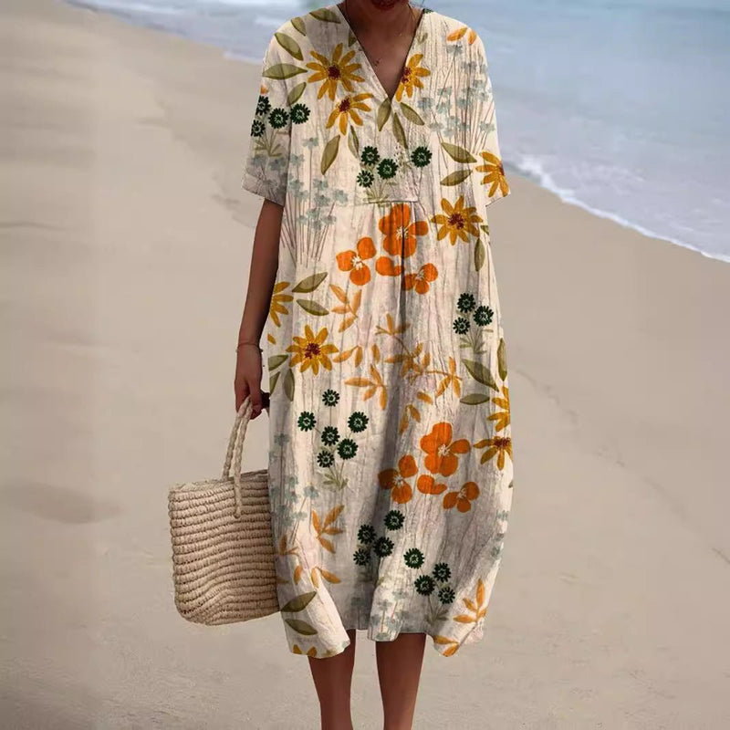 Sommerkleid mit Blumenmuster und kurzen Ärmeln