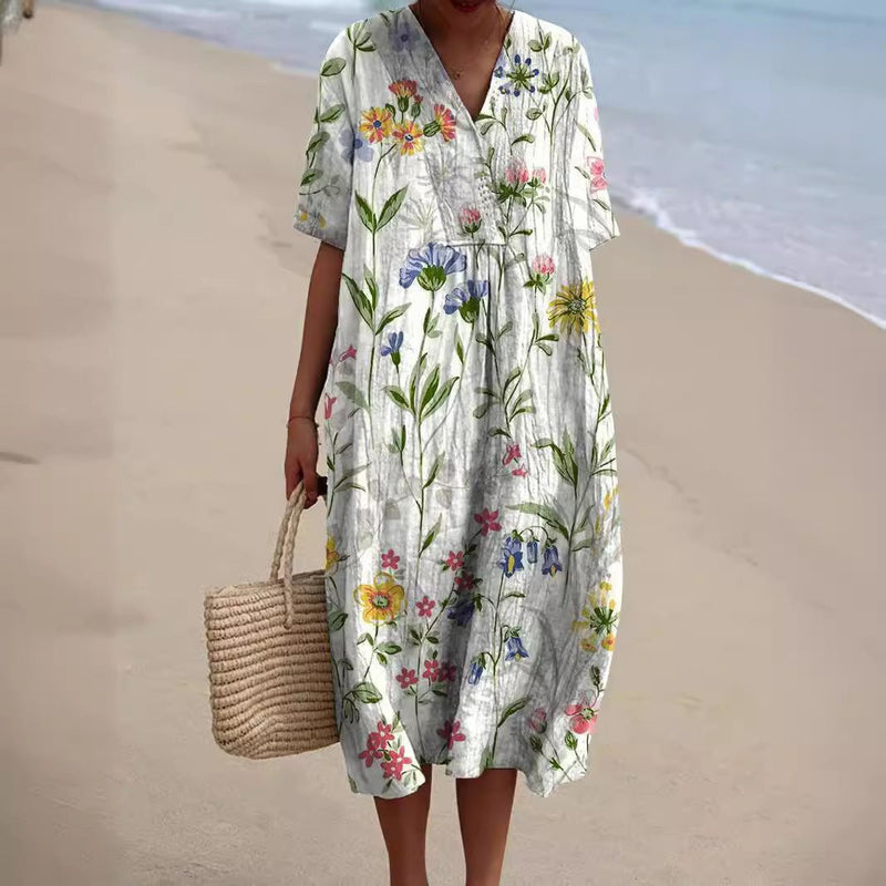 Sommerkleid mit Blumenmuster und kurzen Ärmeln